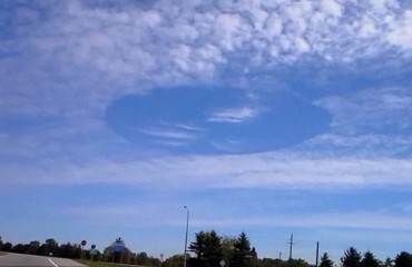 加拿大上空惊現神秘白雲圓孔